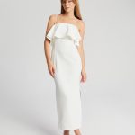 biala sukienka midi z falbana